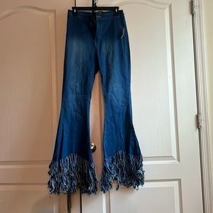 Fringed/flared blue jeans.
